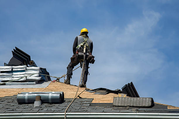Professional Roofing technician working in Center Moriches, NY
